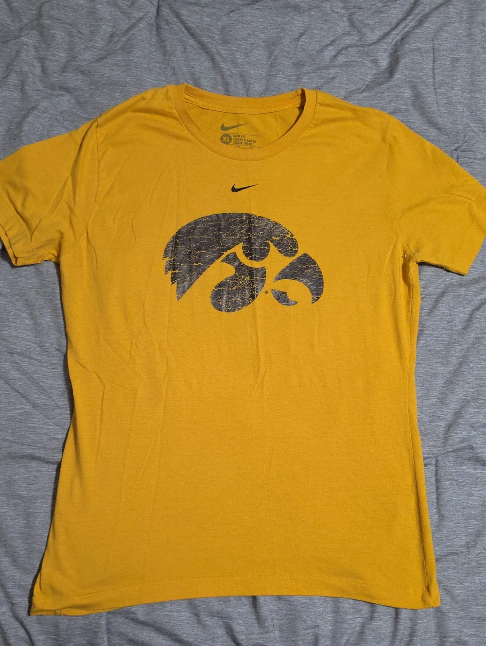Nike Women's Gold Crewneck Short-Sleeve Tee with Black Hawk Logo Iowa